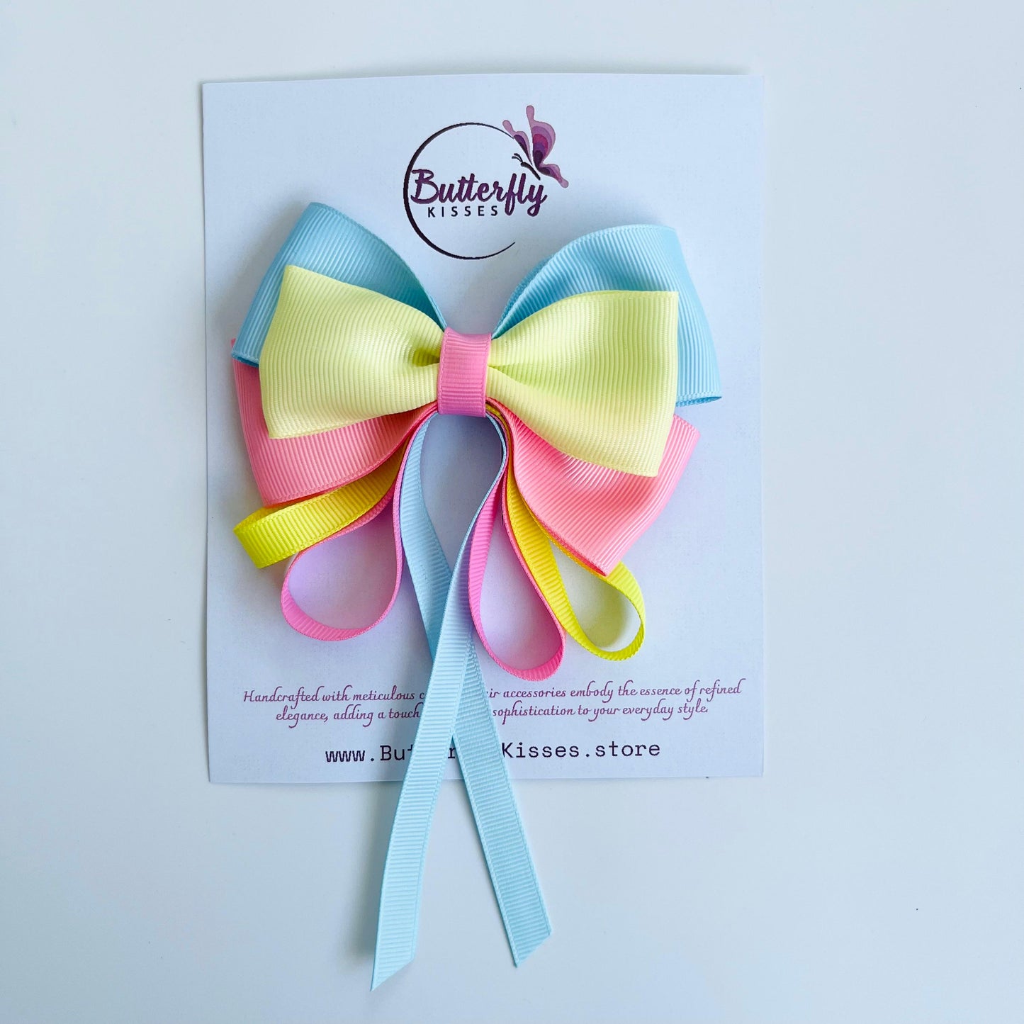 Blossom Dreams Triple-Tone Pigtail Bow with Tail