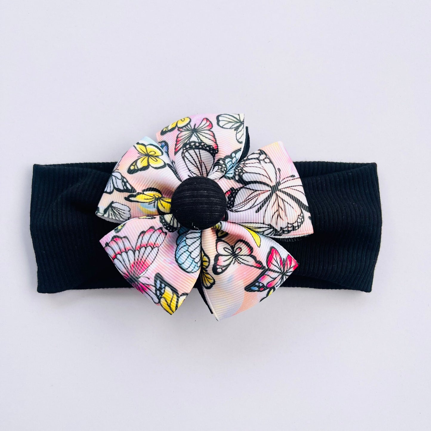 Black Colour Headband With Butterfly Printed Ribbon Flower