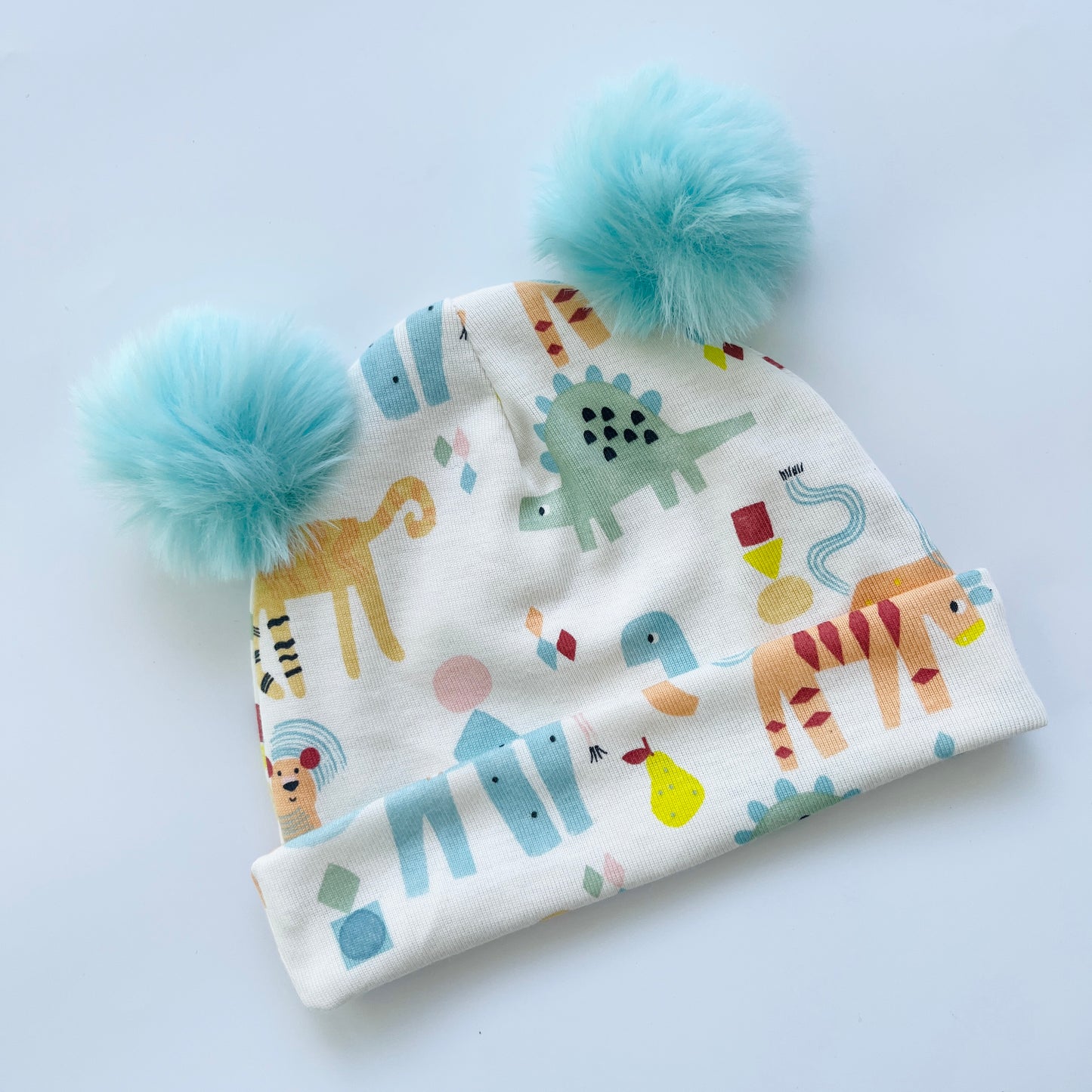 Animals Printed Hat with Light Blue Pom Pom Balls – Cute & Cozy for Boys