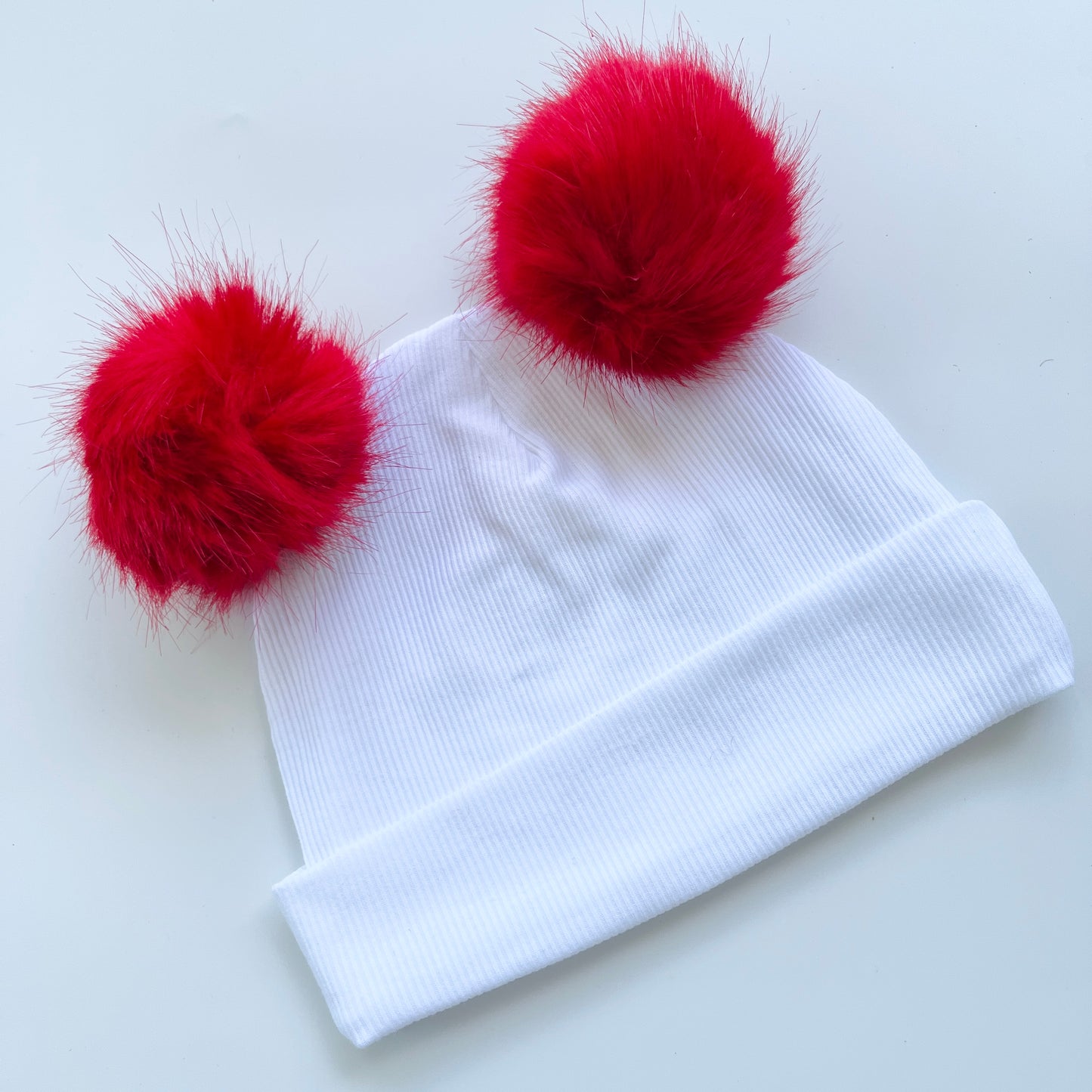 White Hat with Red Pom Pom Balls for Babies & Kids – Soft & Stylish