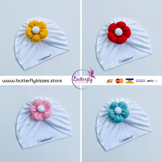 White Baby Turban with Puffy Flower in Red, Blue, Yellow & Pink