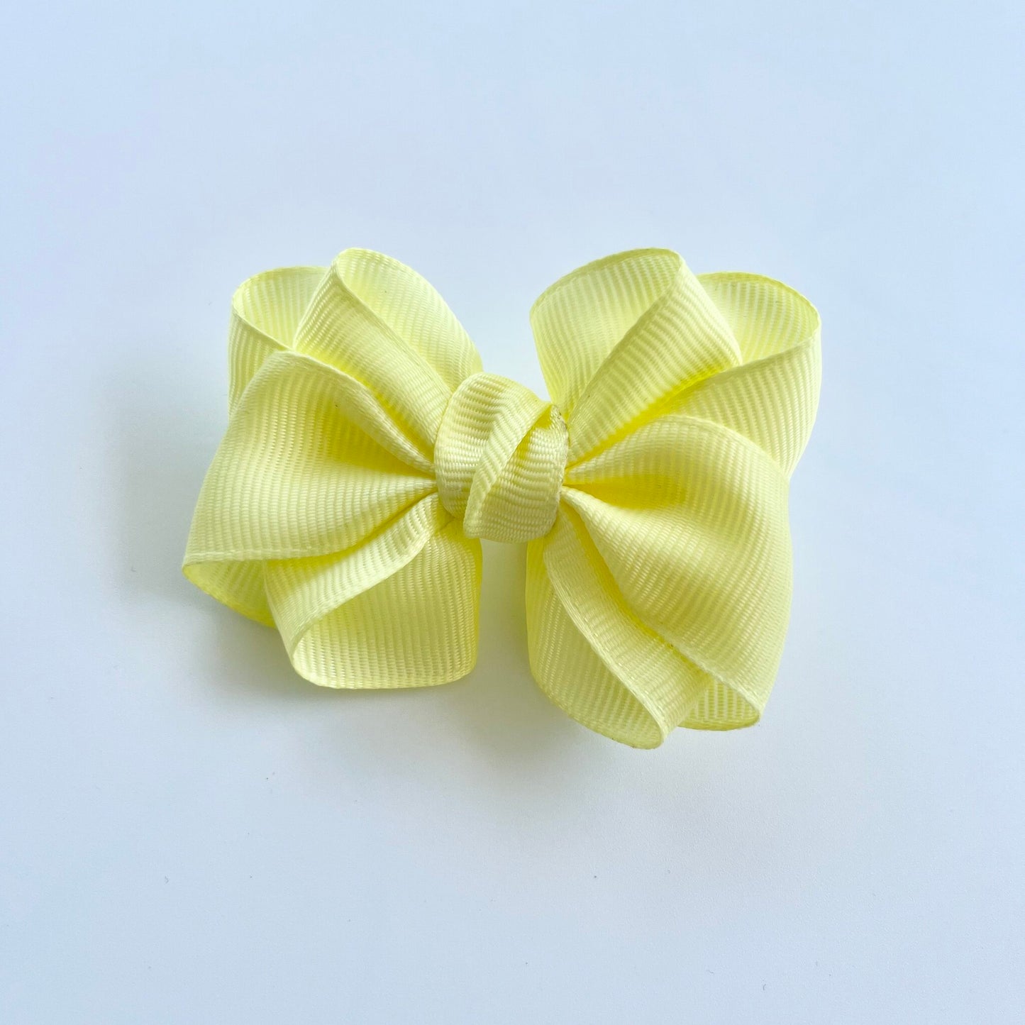 Yellow Colour Twisted Ribbon Bow Hair Clip