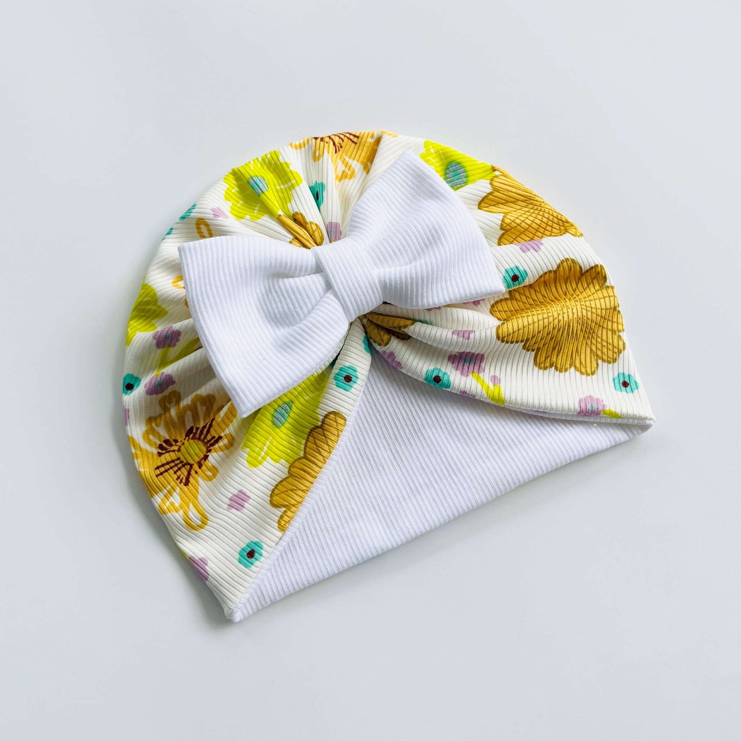 White, Yellow & Brown Floral Printed Baby Turban Hats in Bow, Flower & Donut Designs