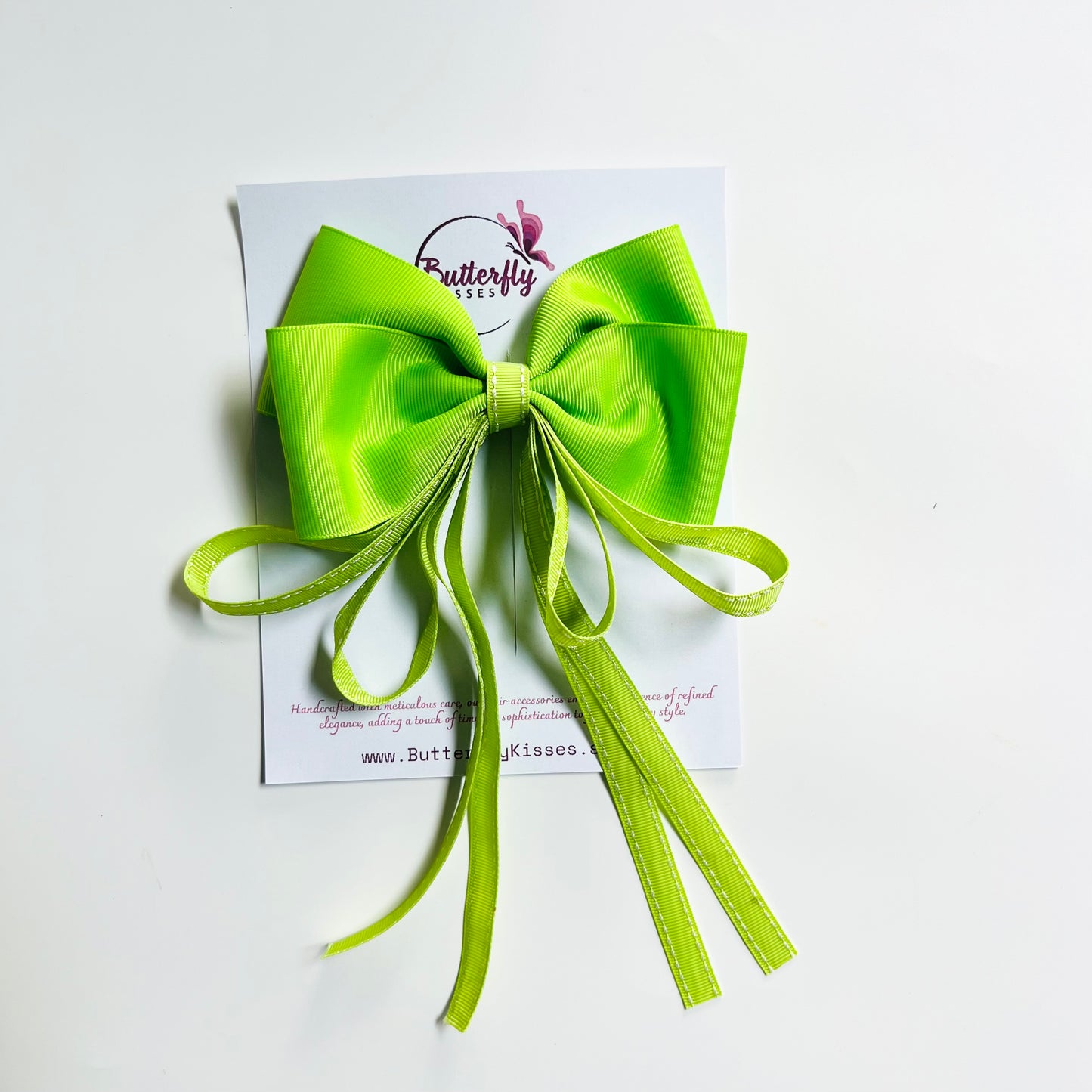 Green Charm Pigtail Bow with Tail