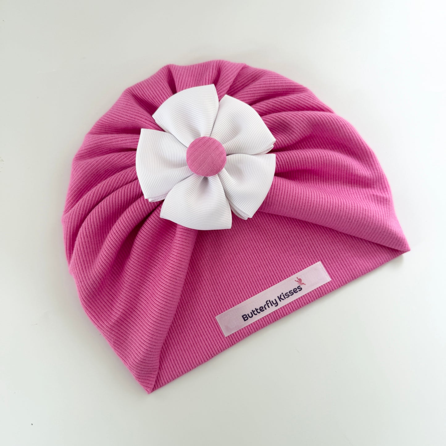 Vibrant Hot Pink Ribbed Baby Turban Hat with White Bloom Flower