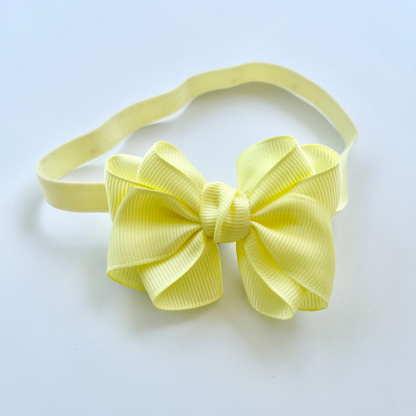 Blue, Green, Pink, Purple, Yellow & Peach Colour Twisted Ribbon Bow Headband